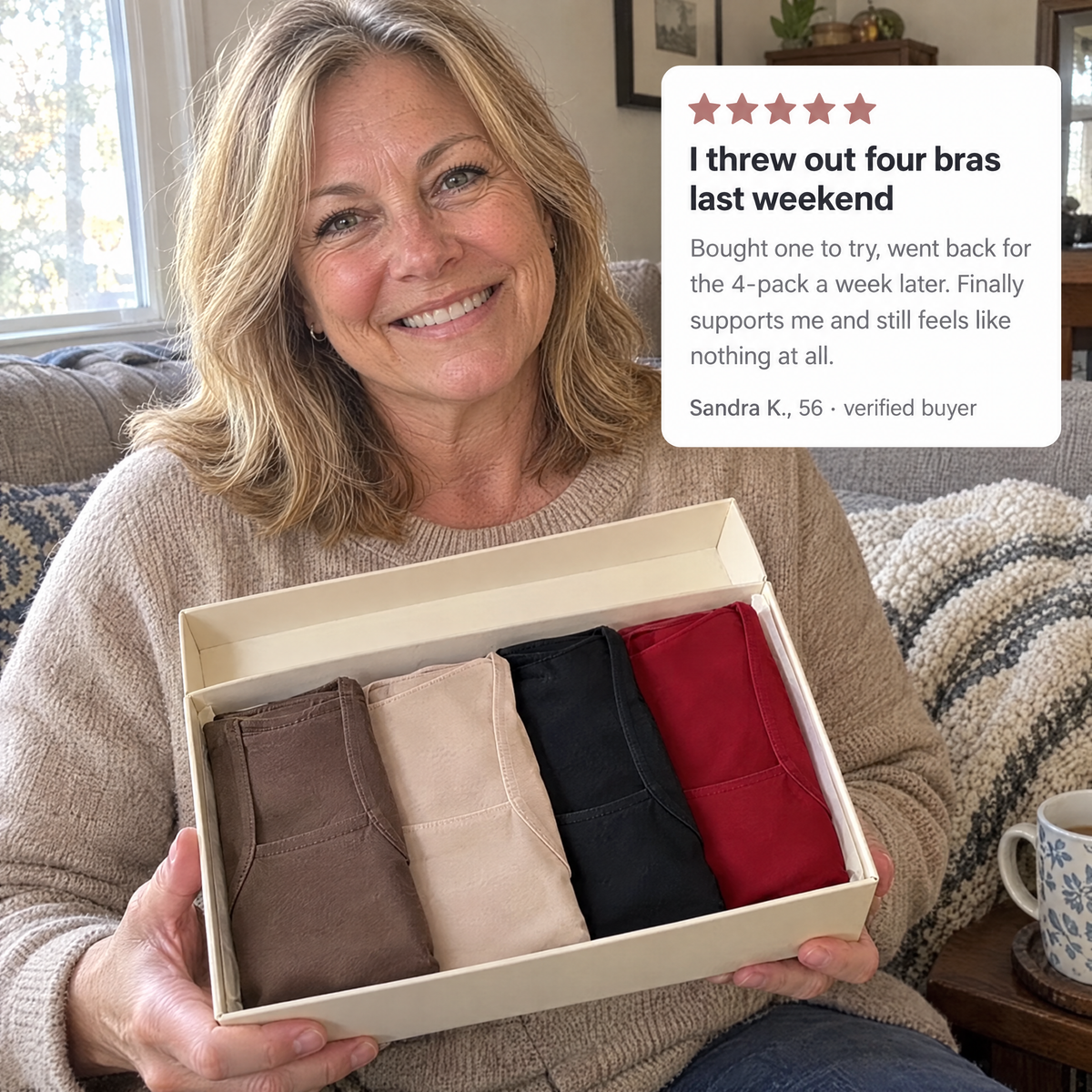 Woman holding a box of four tanks with a review