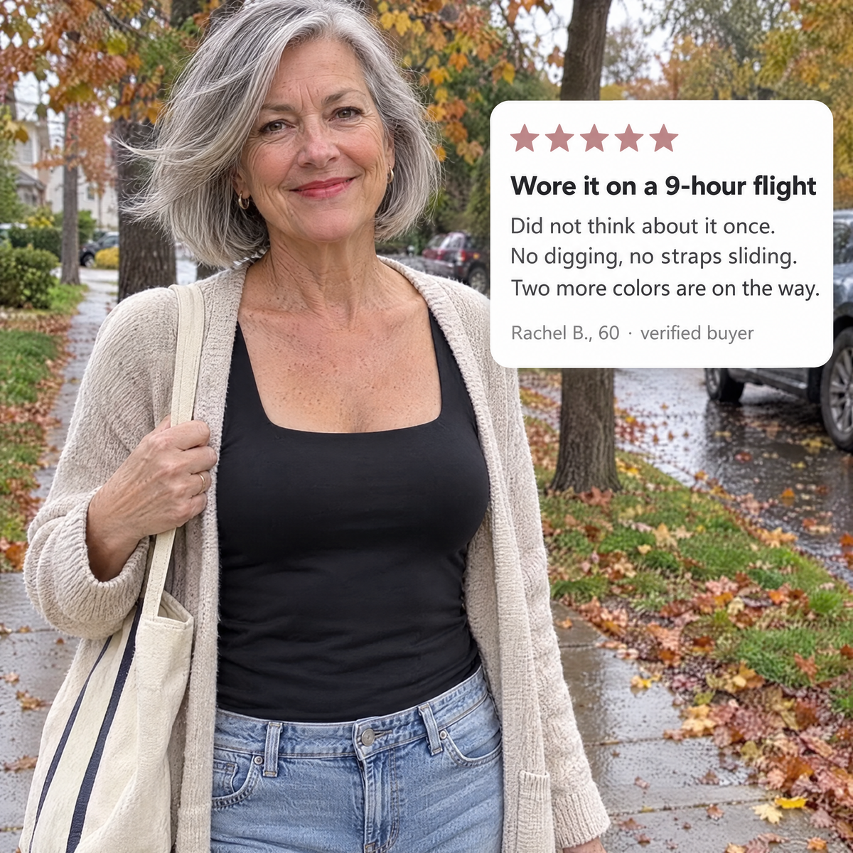 Woman wearing the black tank under a cardigan with a review