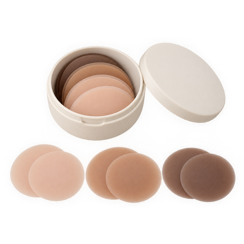Three pairs of reusable silicone nipple covers in light nude, medium nude and mocha with their travel case