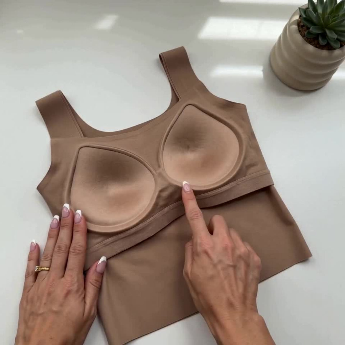Close-up of the tank turned inside out: two molded cups sewn in on all four sides