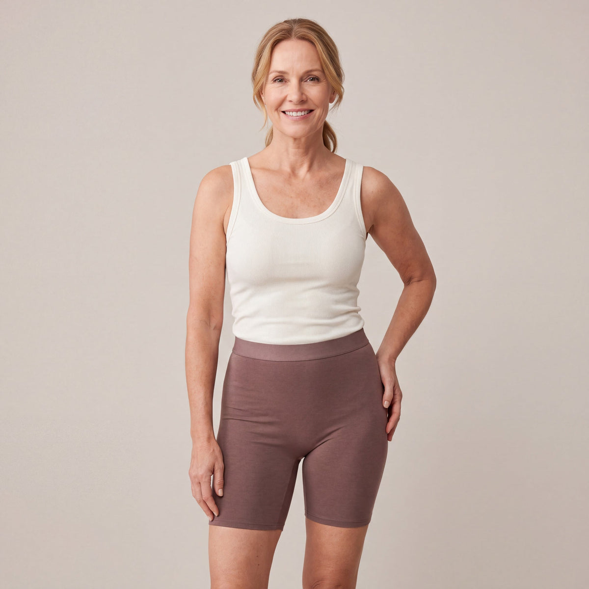 Woman wearing the 3-in-1 Bamboo Boxer Shorts in mocha