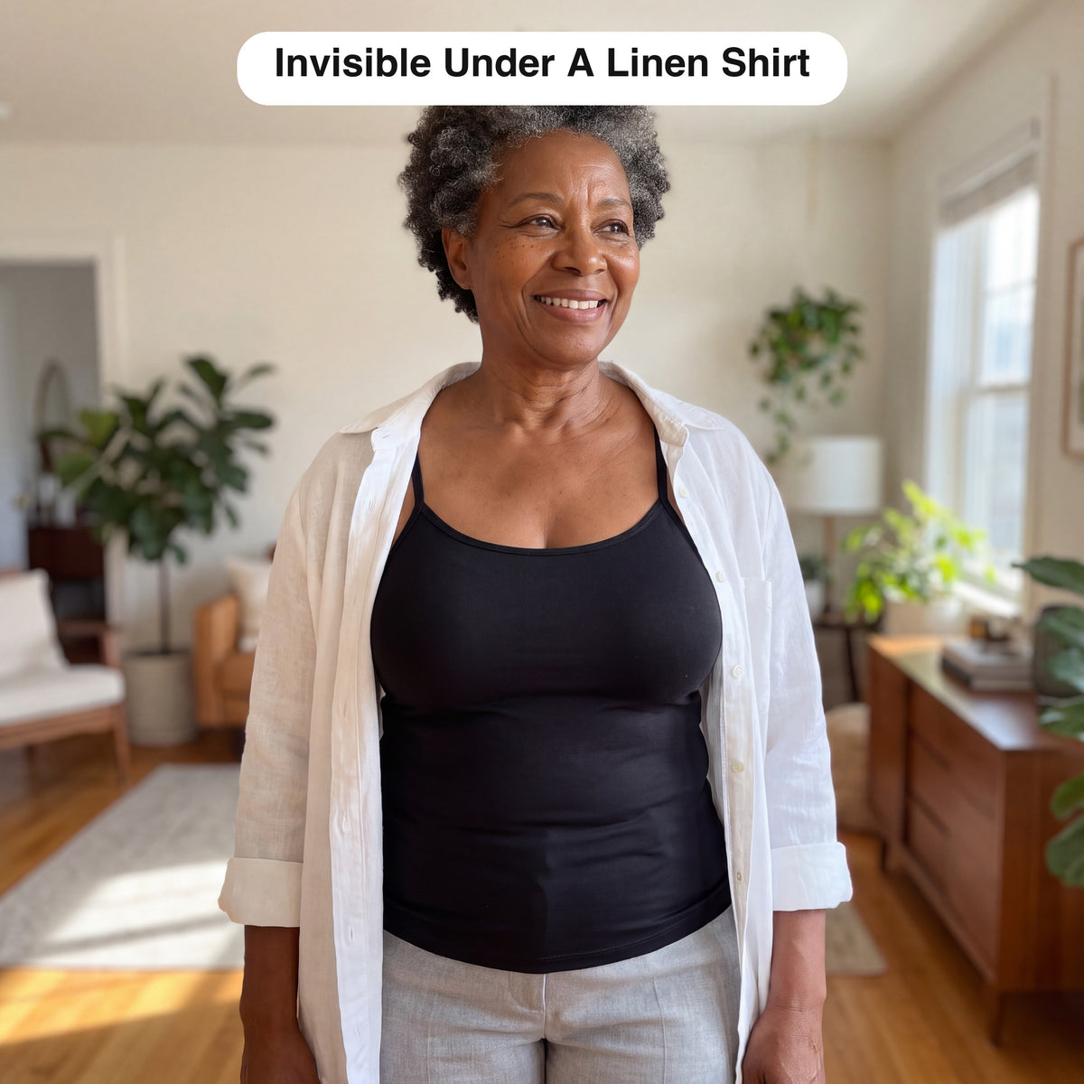 The Built-In Bra Camisole worn under an open layer