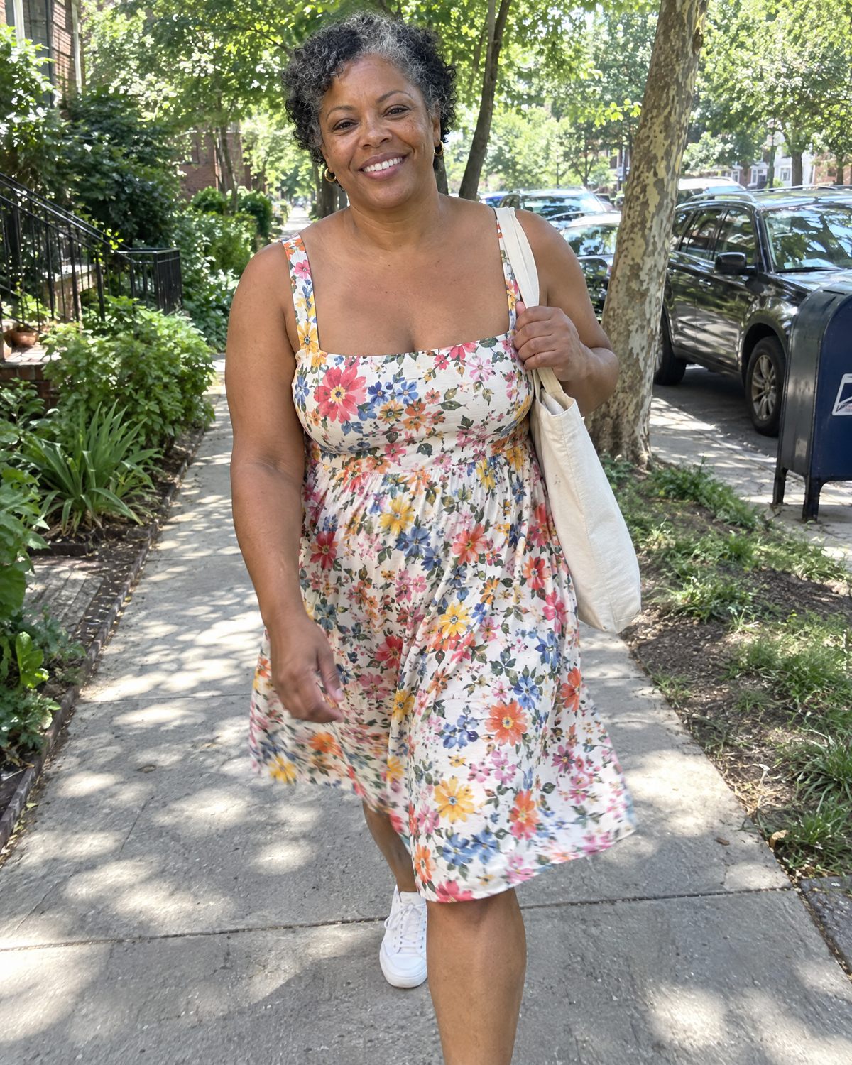 Woman walking briskly in a summer dress