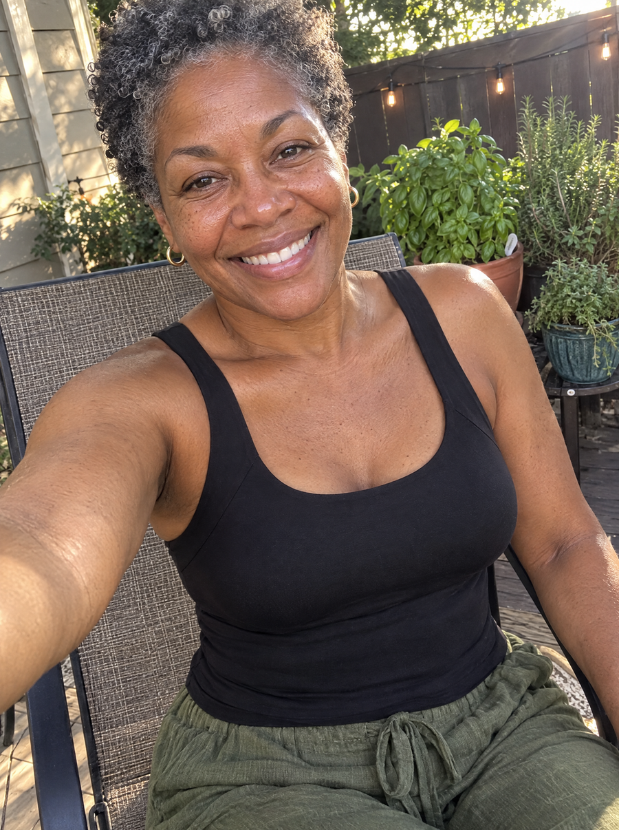 Customer selfie on her patio in a black tank
